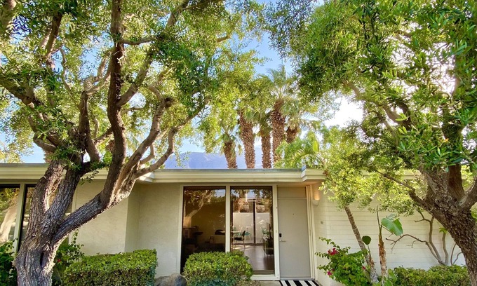 Palm Springs Condo | Stylish and sun filled condo with mountain views, private patio and lush grounds