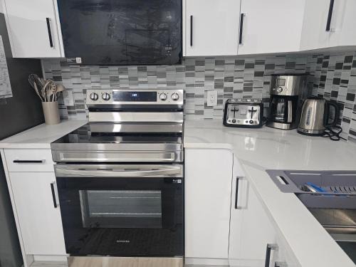 Southwest Edmonton Apartment | Stylish Basement Suite Near Airport, Trails & Dining