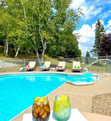 Johnsburg Ski Chalet | Stylish Mountain View Chalet with Heated Pool, Large Hot Tub, Playroom & Firepit close to Gore Mountain