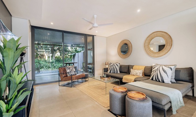 Salt Rock Apartment | Stylish Retreat, Forest, Braai & Back-up Power