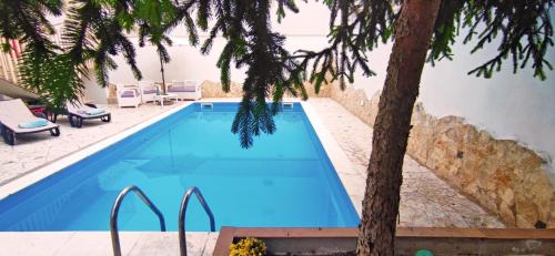 Valenzano House | SUITE ROSETTA