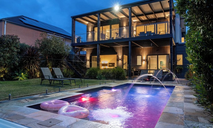 Curlewis House | Summer-Ready Retreat: Sparkling Bay Views, Heated Pool, Fire Pit & Games