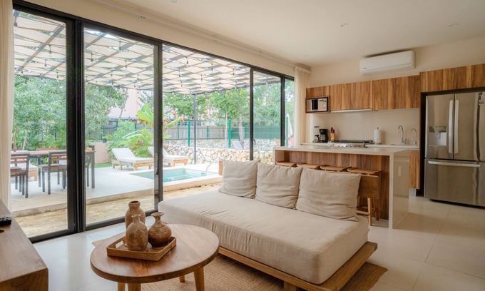 Tulum House | Sun-soaked & modern beach getaway with pool, generous patio, gym, & great views