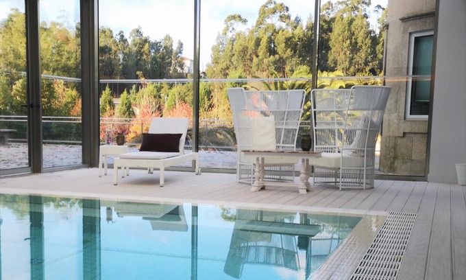 Sandim House | Sundial Gardens & Suites