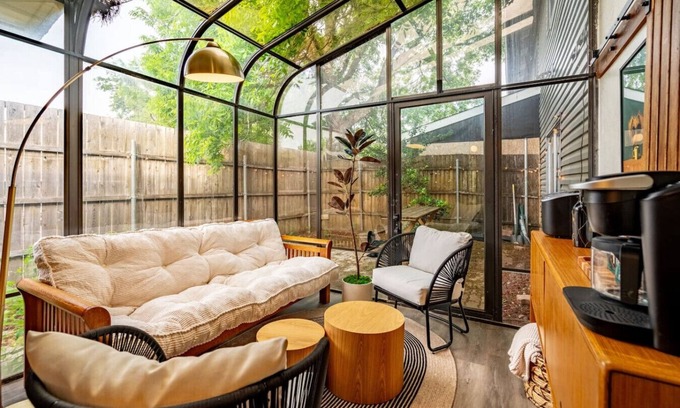 Garland House | Sunlit Designer Home with Tranquil Sunroom Space