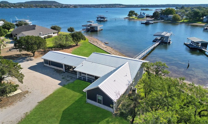 Graford House | Sunrise Shore: Lakefront property with a private dock and slide. Sleeps 14