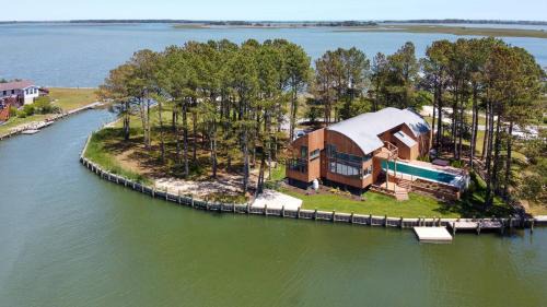 Deep Hole House | Sunrise Shore - Waterfront with private pool & hot tub!