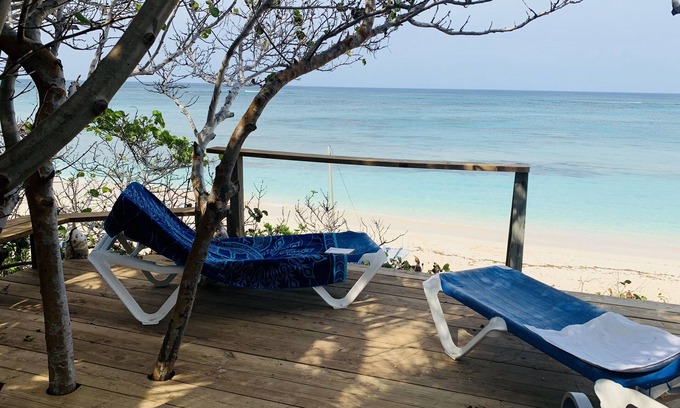 Governor's Harbour Apartment | Sunset apartment at Casuarina Bay, beachfront with western sunset views