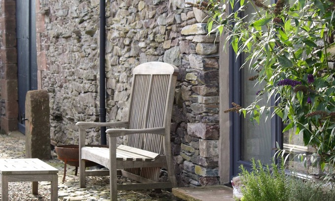 Penrith Cottage | Surrounded by open fields and with lovely views from the grounds, 1 mile from Ullswater.