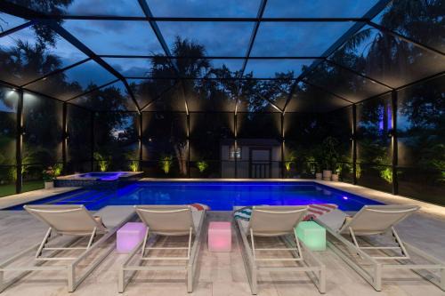 Old Seminole Heights House | Tampa Family Fun Pool Spa Grill Mini Golf & Games