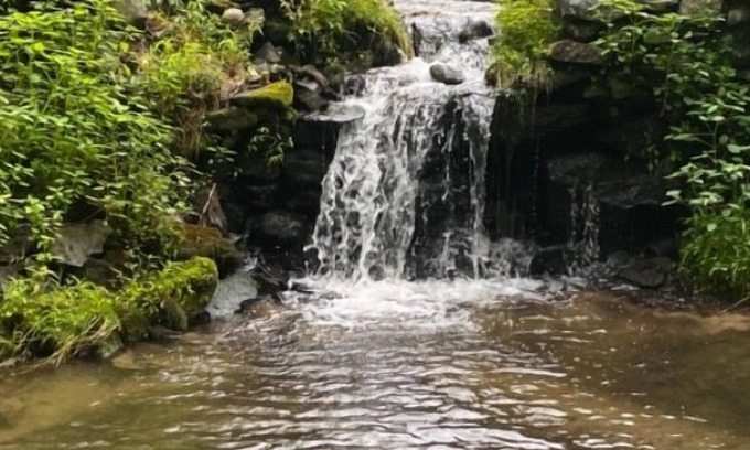 Mount Hope RV Rental | Tentrr Signature Site - Lake Hills Farm - Stream Side Camping