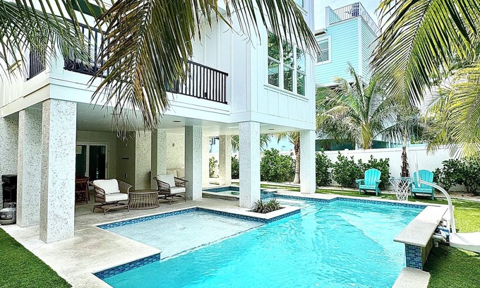 Bradenton Beach House | Thanksgiving Availability in this gorgeous 7 bedroom beach house! Heated pool