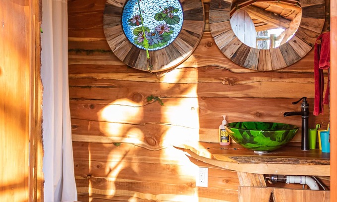 Paige Cottage | The Enchanting Hobbit's Nest Treehouse- A Magical Escape in the Lost Pines Shire