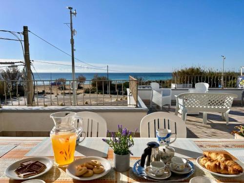 Posto Vecchio Apartment | The Front Beach Penthouse 20 m by Salento Prime