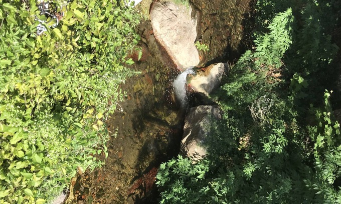 Calci House | The house in front of the creek