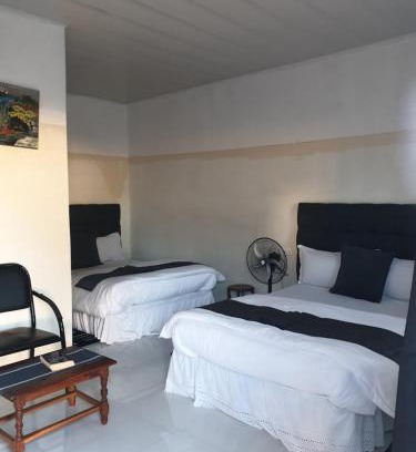 Mpemba Cabin | The Oasis Evergreen Lodge