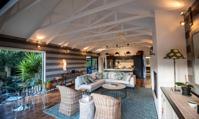 Omiha House | The Pavilion, Ōmiha - Welcome to The Pavilion, Ōmiha, a stunning premium holiday home nestled in the picturesque surroundings of unspoiled Ōmiha, a sanctuary for the island's native birdlife and flora. This exquisite two-bedroom, two-bathroom retreat