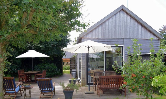Egmond aan den Hoef Apartment | The rustic holiday home with sleeping loft is located in the immediate vicinity of the dune reserve North Holland in Egmond Binnen.