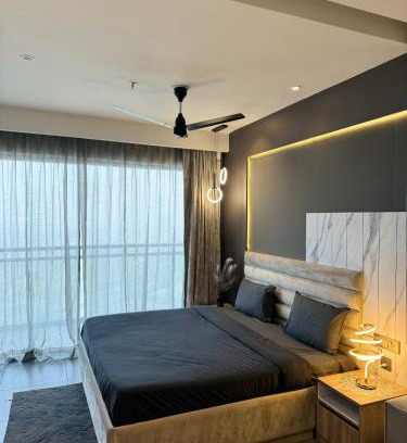 Noida Apartment | The Smoke by Velvet 40th Floor City & River View