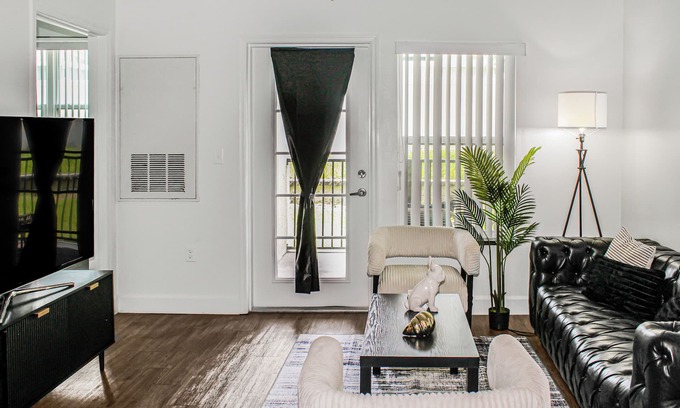 Kissimmee Apartment | The Tuxedo 2BD Stay in Kissimmee with fitness room, Free WIFI, Free Parking