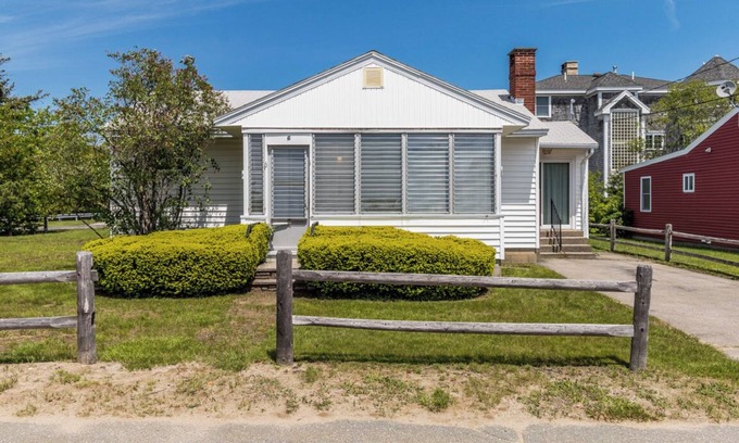 Southern Coast Cottage | This charming cottage boast an enclosed porch for the beautiful Ocean Views!