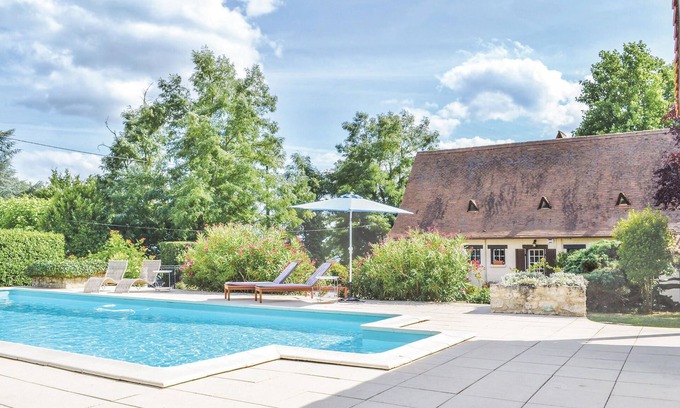 Velines House | This inviting vacation home with private pool is nestled in a beautiful enclosed garden.