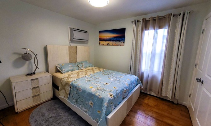 Queens Apartment | This luxury space is a cozy 2 BDR with shared common space fully furnished!n