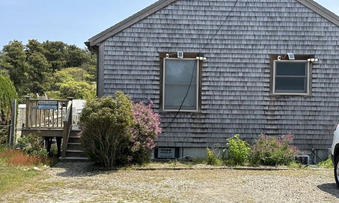 Nantucket Cottage | This two-bedroom cottage features one queen bed, two twin beds, and a sofa bed.