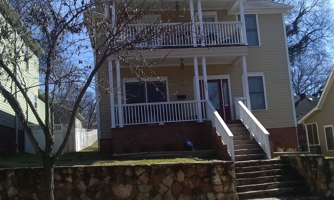 MLK University House | This two story 4br home Victorian home boast the best location in the city!