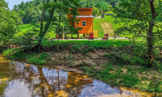 Hillsville Cabin | Tiny cabin sits by a bubbling, stocked creek. Pet friendly, for a fee, hot tub