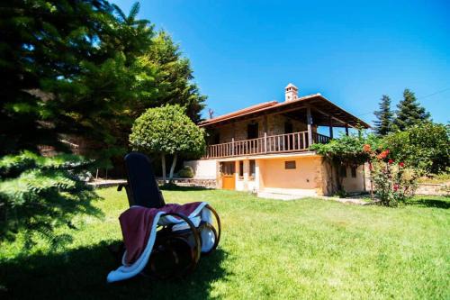 Corinthia Region House | Traditional Stone Home with view