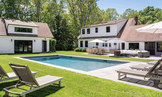 Sag Harbor House | Traditional-style home with pops of patterns and vibrant colors, private.