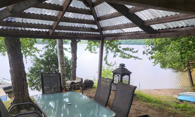 Novar House | Tranquil cottage on a lake with canoes, dock and lots of peace.