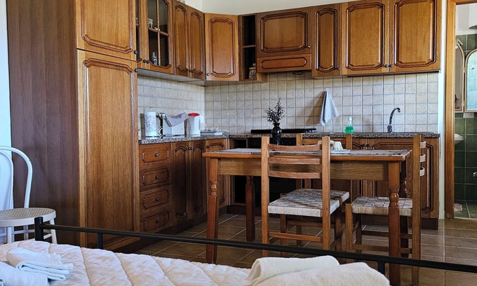 Caltagirone Apartment | Tre Palmi, minicasa con ampia veranda, giardino, parcheggio e bbq