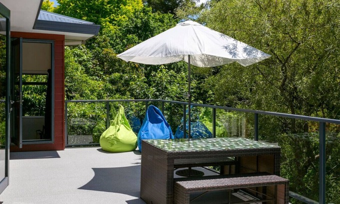 Waipahihi House | Treetop Living - peaceful oasis, serene and cozy interior, scenic views of native bush.
