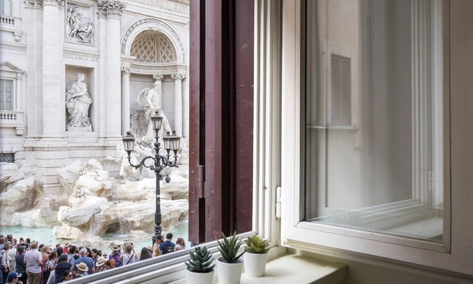 Rione II Trevi Apartment | Trevi fountain from your window- center Rome