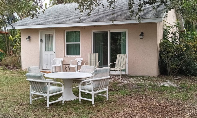 Englewood South Cottage | Tropical Garden Cottage only 3 miles to beautiful Englewood Beach. Pet-friendly!