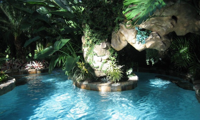 Sailboat Bend House | Tropical House with 80' boat dock and waterfall pool on the New River