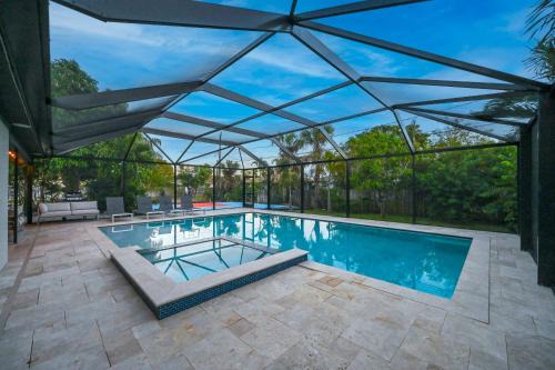 Naples Park House | Tropical Naples Hideaway - 1 Mi to Beaches!