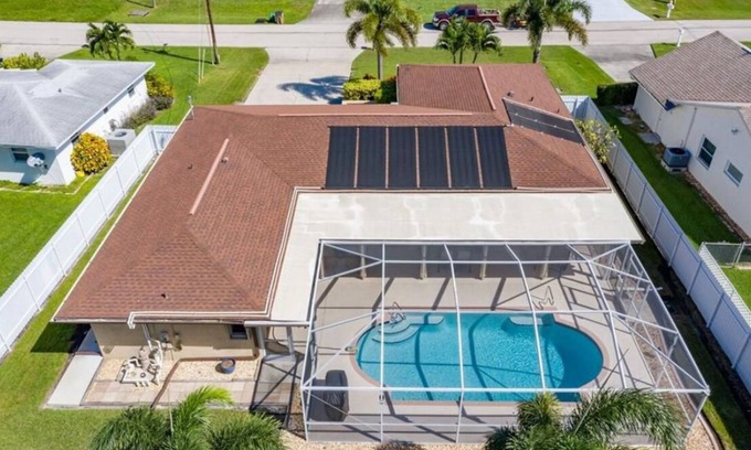 Caloosahatchee House | Tropical Poolside Escape in Cape Coral