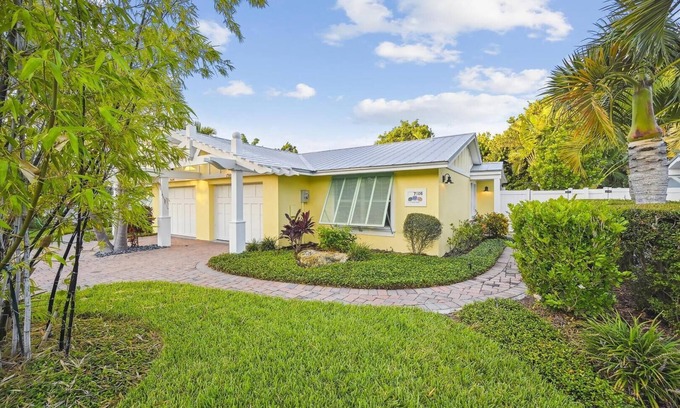 Holmes Beach Cottage | Two Bedroom Ground Floor Island Home Sleeps 5 and Includes Heated Pool.