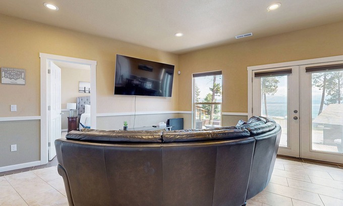 Lakeside House | Two-level lakefront home with hot tub access, AC, W/D, & lovely patio