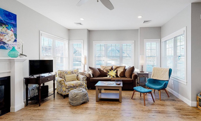 Arundel Condo | Two stroy condo with heated pool, gym, private patio, gas fireplace, W/D, AC