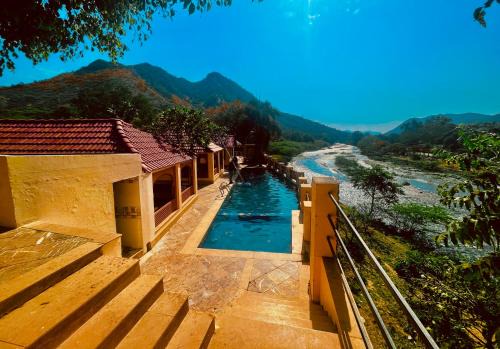 Hisar Hotel | Uday Valley Farmhouse Resort, Udaipur - A Riverside Retreat