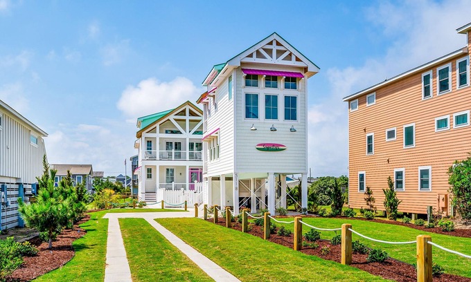 Kitty Hawk House | Unique coastal home & pool house with private pool and retro finishes