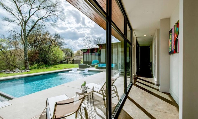 Urbandale Nations House | Unique Modern Ranch with Pool, Hot Tub, Grill & Fireplace