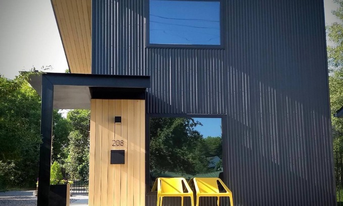 Bozeman House | Unwind in the sizeable comforts of this small modern space.