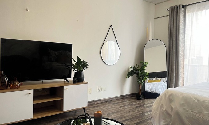 Downtown Johannesburg Apartment | Urban energy meets secure comfort in a historic landmark.