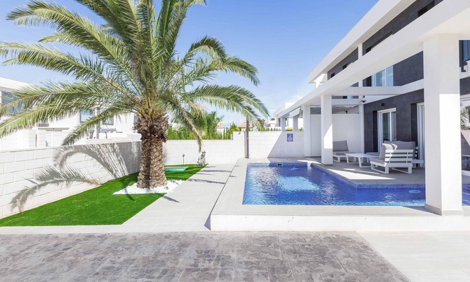 Puerto Marino Villa | Vacation Home "Casa Bos Dolphin Pool Jacuzzi 6P" with Wi-Fi, A/C, Balcony, Terrace & Garden