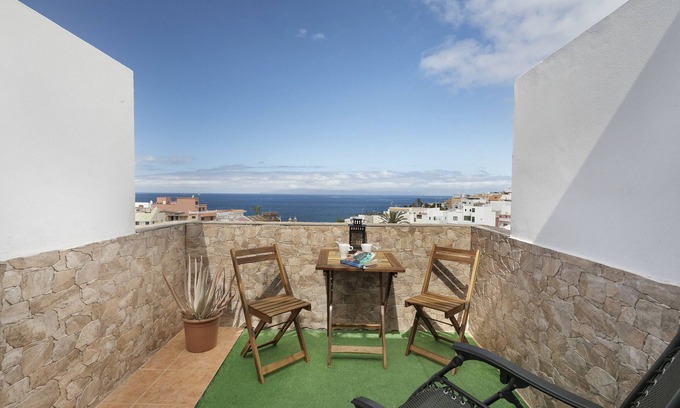 Alcala Apartment | Vacation Apartment 'Atico Castellano' with Sea View, Private Terrace and Wi-Fi